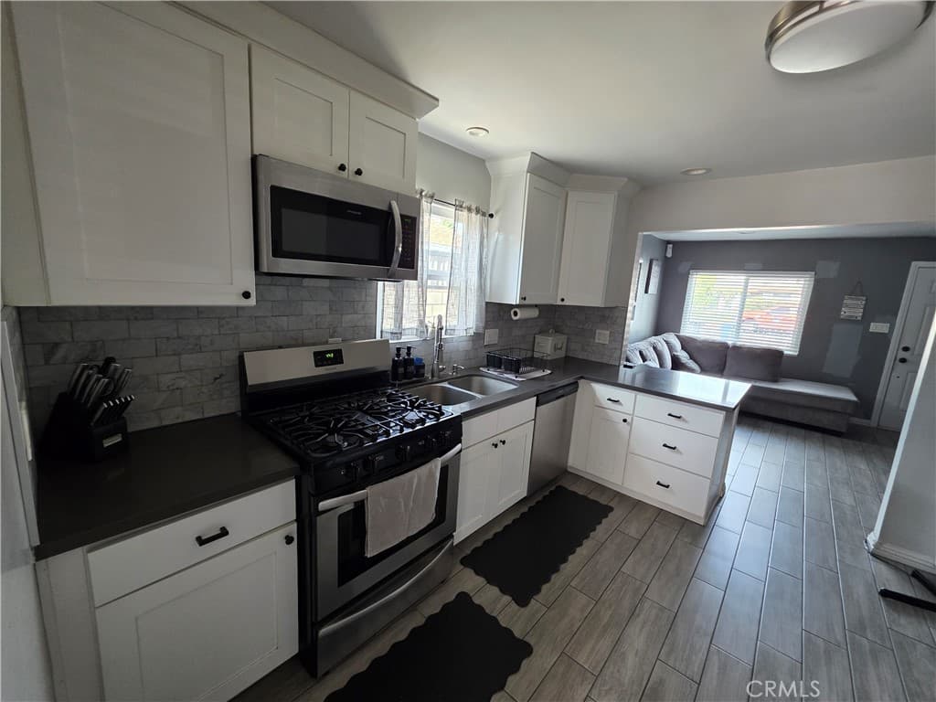 Home at 935 S Main, Pomona — photo 6 of 12