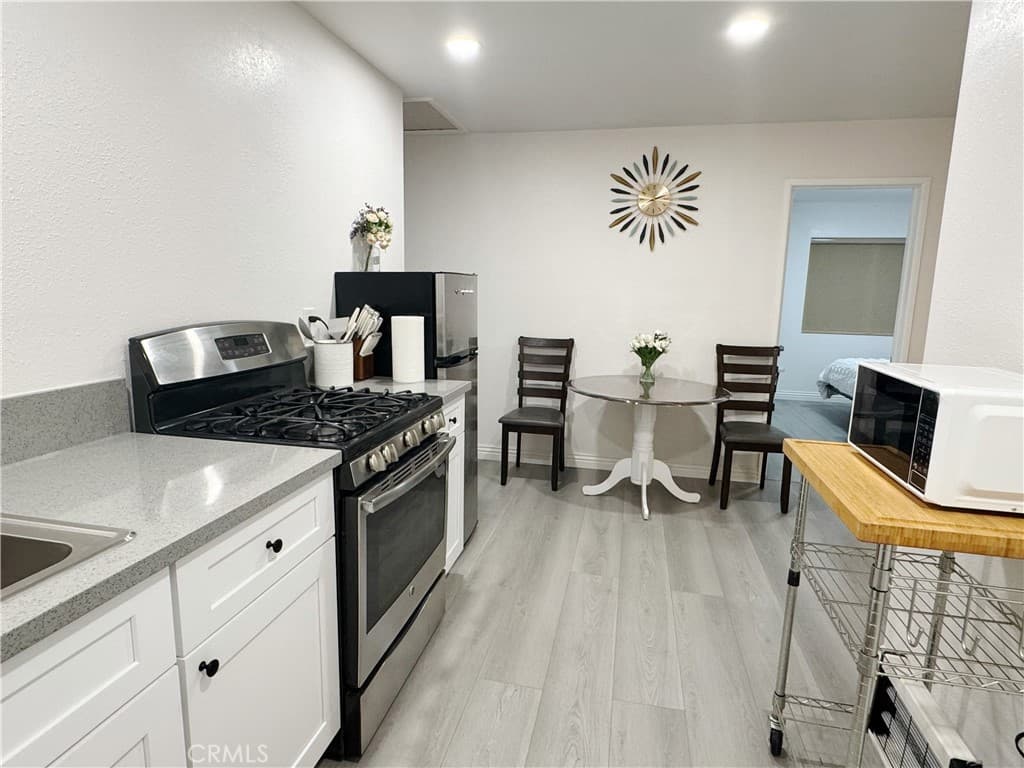 Home at 114 W Olive, Pomona — photo 5 of 12