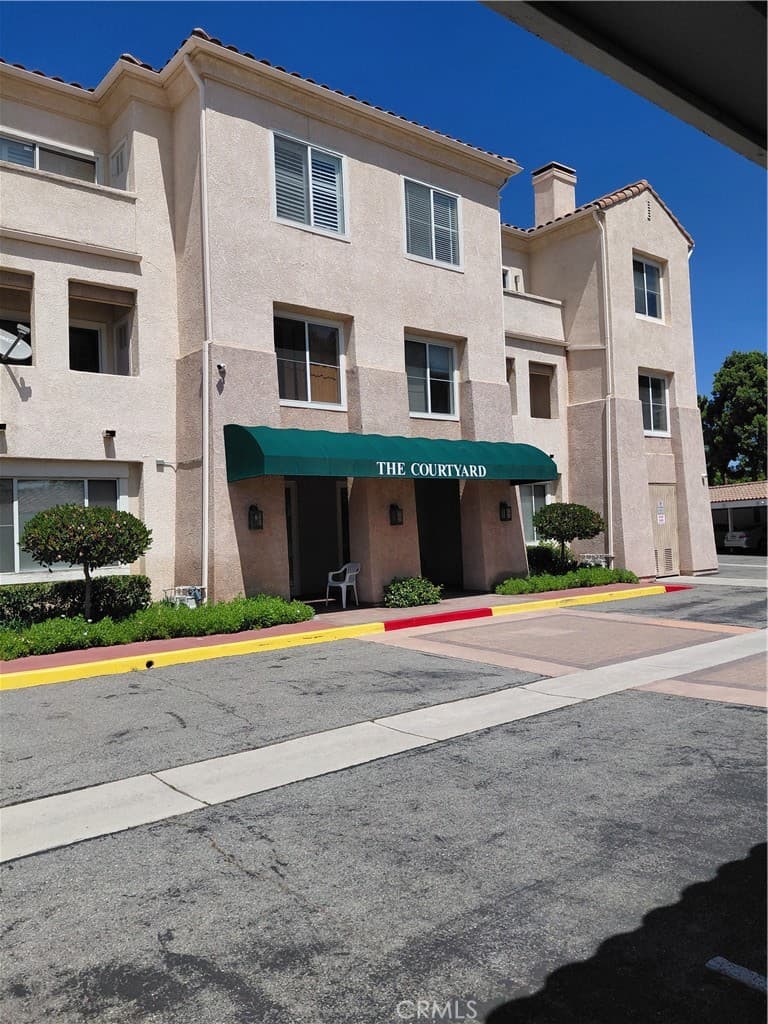 Condo at 130 S Barranca Street S 206, West Covina — photo 1 of 12