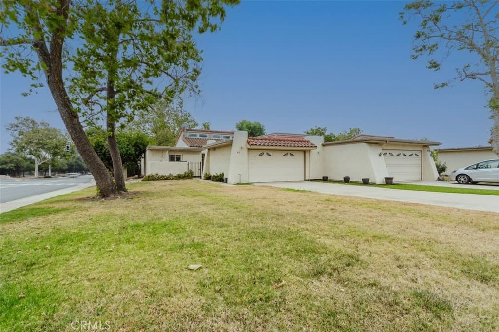 Home at 410 Champlain Drive, Claremont — photo 1 of 12