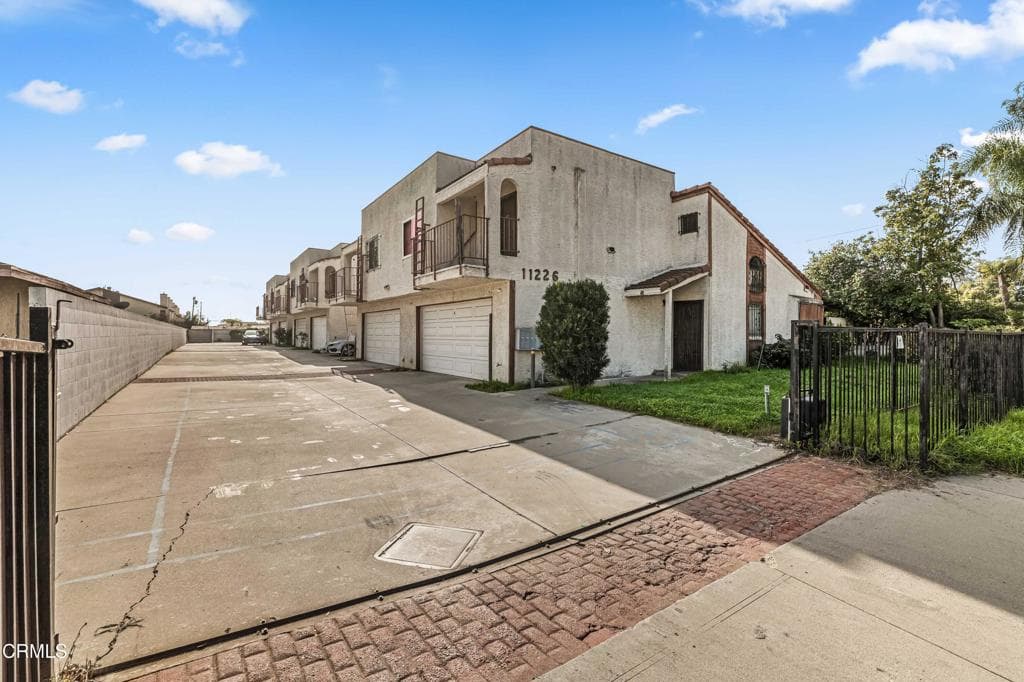 Condo at 11226 Elliott Avenue E, El Monte — photo 1 of 12